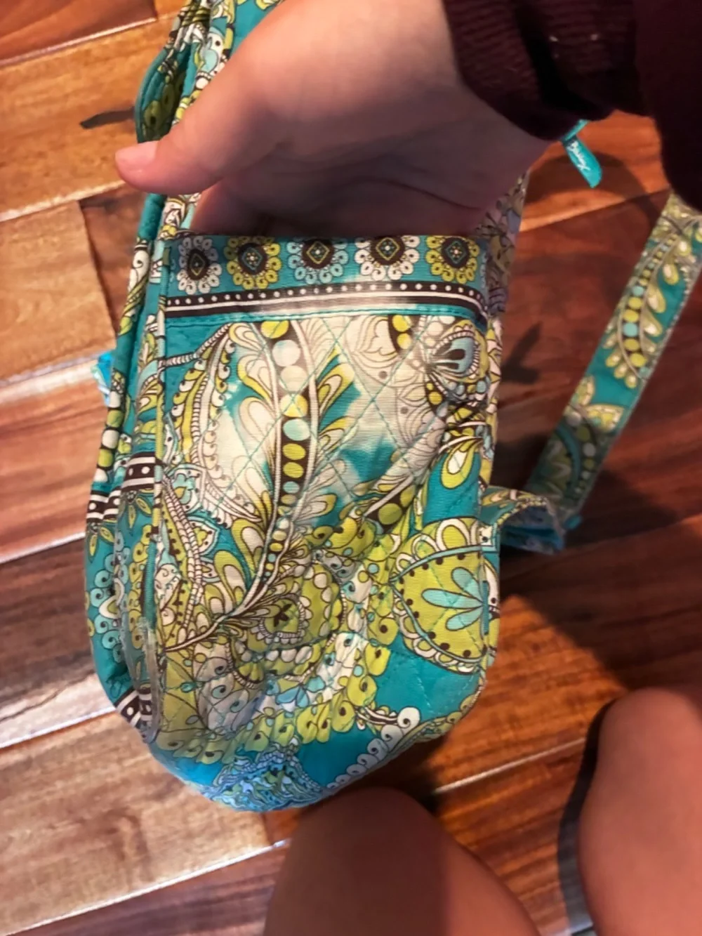 Peacock green Vera Bradley backpack with little necessity pouch